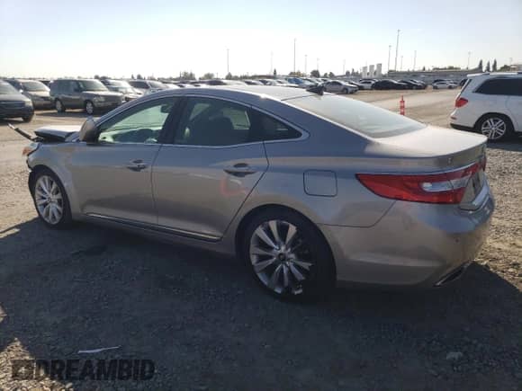 2012 Hyundai Azera with VIN KMHFH4JG7CA124394, listed as a Copart auction lot 81489605 with 61,823 mi miles and Salvage title. Bid and sale history available at DreamBid. Image 2.