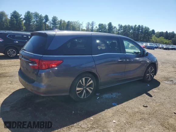✅ 2021 Honda Odyssey Touring • VIN: 5FNRL6H85MB013894 • Lot: 71153575. Listed on Copart with 60,452 mi. Free auction sales archive from the USA and detailed vehicle history report at DreamBid. Image 3.