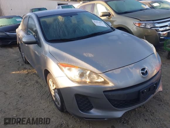 ✅ 2012 Mazda 3 i Touring • VIN: JM1BL1V7XC1550980 • Lot: 43473671. Listed on IAAI with 96,476 mi. Free auction sales archive from the USA and detailed vehicle history report at DreamBid. Image 1.