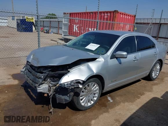 ✅ 2011 Ford Fusion Hybrid • VIN: 3FADP0L32BR345235 • Lot: 42322127. Listed on IAAI with 120,968 mi. Free auction sales archive from the USA and detailed vehicle history report at DreamBid. Image 2.