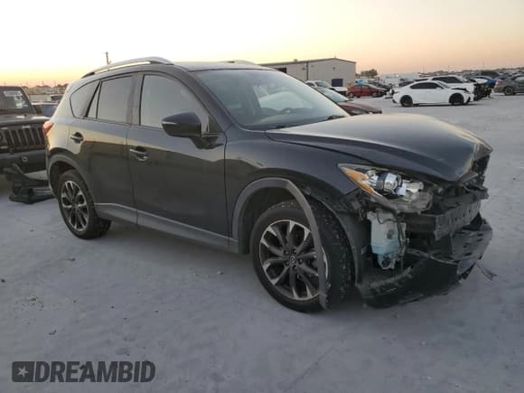✅ 2016 Mazda CX-5 Grand Touring • VIN: JM3KE4DY0G0639787 • Lot: 86552235. Wystawiony na Copart z przebiegiem 118 714 mil. Bezpłatny archiwum sprzedaży aukcyjnych z USA i szczegółowy raport historii pojazdu na DreamBid. Zdjęcie 4.
