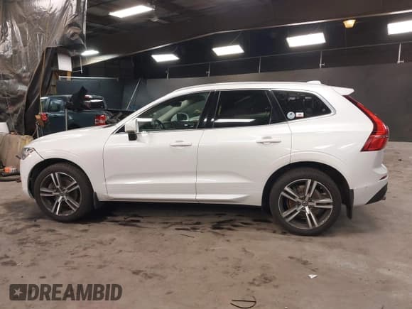 ✅ 2019 Volvo XC60 Momentum • VIN: LYVA22RK2KB230191 • Lot: 41248426. Listed on IAAI with 80,347 mi. Free auction sales archive from the USA and detailed vehicle history report at DreamBid. Image 14.