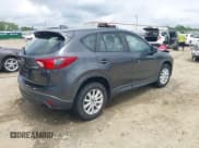 ✅ 2014 Mazda CX-5 Sport • VIN: JM3KE2BE5E0350057 • Lot: 42145910. Listed on IAAI with 157,517 mi. Free auction sales archive from the USA and detailed vehicle history report at DreamBid. Image 4.