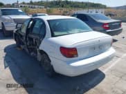 ✅ 2002 Saturn SL • VIN: 1G8ZH52802Z154555 • Lot: 42771346. Listed on IAAI with 248,496 mi. Free auction sales archive from the USA and detailed vehicle history report at DreamBid. Image 3.