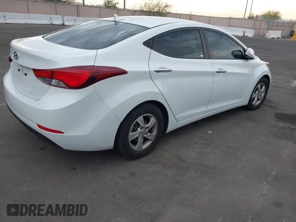 ✅ 2015 Hyundai Elantra SE • VIN: 5NPDH4AE4FH590128 • Lot: 43692893. Listed on IAAI with 81,836 mi. Free auction sales archive from the USA and detailed vehicle history report at DreamBid. Image 4.