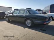 ✅ 1989 Jaguar XJ • VIN: SAJHY1649KC553759 • Лот: 42265145. Опубликован ранее на Copart с пробегом 81 668 миль. Бесплатный доступ к архиву аукционных продаж из США и подробный отчёт об истории автомобиля на DreamBid. Изображение 2.