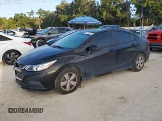 ✅ 2018 Chevrolet Cruze LS • VIN: 1G1BB5SM7J7203839 • Lot: 84742265. Listed on Copart with 87,543 mi. Free auction sales archive from the USA and detailed vehicle history report at DreamBid. Image 1.
