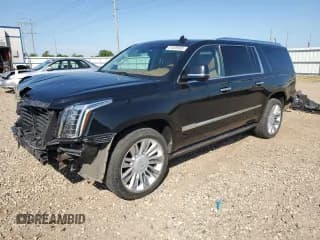 ✅ 2015 Cadillac Escalade ESV Platinum • VIN: 1GYS4UKJ9FR712533 • Lot: 61638935. Listed on Copart with 92,245 mi. Free auction sales archive from the USA and detailed vehicle history report at DreamBid. Image 1.