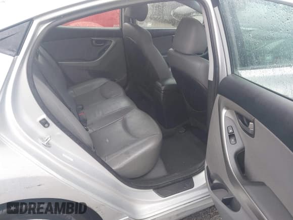 ✅ 2013 Hyundai Elantra GLS • VIN: KMHDH4AE1DU559210 • Lot: 43217612. Listed on IAAI with 106,194 mi. Free auction sales archive from the USA and detailed vehicle history report at DreamBid. Image 8.