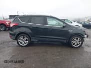 ✅ 2015 Ford Escape Titanium • VIN: 1FMCU9J9XFUB77087 • Lot: 43771373. Listed on IAAI with 95,650 mi. Free auction sales archive from the USA and detailed vehicle history report at DreamBid. Image 13.