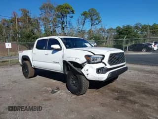 ✅ 2022 Toyota Tacoma TRD Off Road • VIN: 3TMCZ5AN6NM507516 • Lot: 43627127. Listed on IAAI with 52,077 mi. Free auction sales archive from the USA and detailed vehicle history report at DreamBid. Image 1.