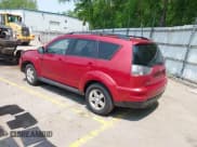 ✅ 2010 Mitsubishi Outlander ES • VIN: JA4AT2AW8AZ013032 • Lot: 42377377. Listed on IAAI with 135,411 mi. Free auction sales archive from the USA and detailed vehicle history report at DreamBid. Image 3.