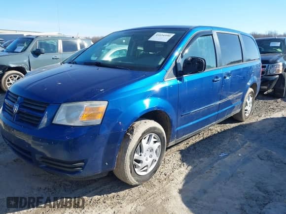 2010 Dodge Grand Caravan SE with VIN 2D4RN4DE6AR443446, listed as a IAAI auction lot 41694990 with 204,625 mi miles and . Bid and sale history available at DreamBid. Image 2.