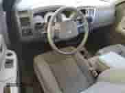 2006 Dodge Dakota SLT z VIN 1D7HE42N36S523634, wystawiony jako Copart lot #62717474 z przebiegiem 72 295 mil mil oraz Szkoda całkowita • Salvage title. Historia ofert i sprzedaży dostępna na DreamBid. Obrazek 8.