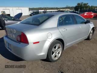 2011 Chevrolet Malibu 1LS z VIN 1G1ZB5E12BF242426, wystawiony jako IAAI lot #43415025 z przebiegiem 88 119 mil mil oraz . Historia ofert i sprzedaży dostępna na DreamBid. Obrazek 4.