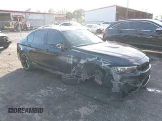 ✅ 2018 BMW M3 • VIN: WBS8M9C51J5L71667 • Lot: 43831833. Listed on IAAI with 53,105 mi. Free auction sales archive from the USA and detailed vehicle history report at DreamBid. Image 1.