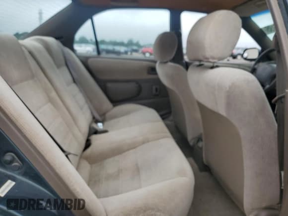 ✅ 1997 Toyota Corolla DX • VIN: 1NXBB02E7VZ612333 • Lot: 64098195. Wystawiony na Copart z przebiegiem 214 128 mil. Bezpłatny archiwum sprzedaży aukcyjnych z USA i szczegółowy raport historii pojazdu na DreamBid. Zdjęcie 10.