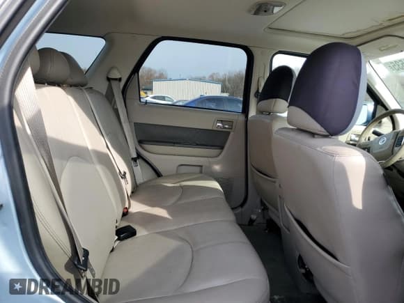 ✅ 2009 Mercury Mariner Premier • VIN: 4M2CU97G19KJ01228 • Лот: 92411535. Опубликован ранее на Copart с пробегом 122 127 миль. Бесплатный доступ к архиву аукционных продаж из США и подробный отчёт об истории автомобиля на DreamBid. Изображение 11.