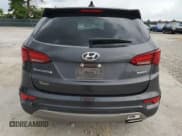 ✅ 2017 Hyundai Santa Fe 2.4L • VIN: 5XYZT3LB0HG469690 • Lot: 64802425. Listed on Copart with 169,198 mi. Free auction sales archive from the USA and detailed vehicle history report at DreamBid. Image 6.