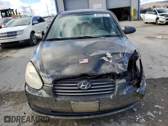 2007 Hyundai Accent GLS z VIN KMHCN46CX7U094863, wystawiony jako Copart lot #80229854 z przebiegiem 150 198 mil mil oraz Szkoda całkowita • Salvage title. Historia ofert i sprzedaży dostępna na DreamBid. Obrazek 5.