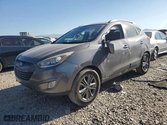 2015 Hyundai Tucson SE z VIN KM8JUCAG8FU007653, wystawiony jako Copart lot #69103044 z przebiegiem 143 509 mil mil oraz Szkoda całkowita • Salvage title. Historia ofert i sprzedaży dostępna na DreamBid. Obrazek 1.