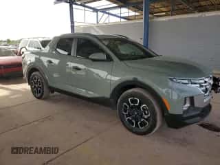 2023 Hyundai Santa Cruz SEL with VIN 5NTJC4AE8PH044985, listed as a Copart auction lot 84774144 with 11,643 mi miles and Salvage title. Bid and sale history available at DreamBid. Image 4.
