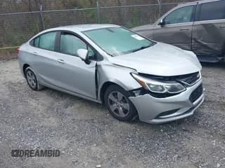 ✅ 2018 Chevrolet Cruze LS • VIN: 1G1BC5SM8J7111460 • Lot: 41209427. Listed on IAAI with 89,637 mi. Free auction sales archive from the USA and detailed vehicle history report at DreamBid. Image 1.