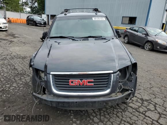 ✅ 2004 GMC Envoy SLT • VIN: 1GKET16S046203411 • Lot: 68126125. Listed on Copart with 246,450 mi. Free auction sales archive from the USA and detailed vehicle history report at DreamBid. Image 5.