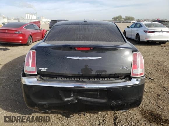 ✅ 2014 Chrysler 300 C • VIN: 2C3CCAEG0EH303724 • Lot: 81971205. Listed on Copart with 97,664 mi. Free auction sales archive from the USA and detailed vehicle history report at DreamBid. Image 6.