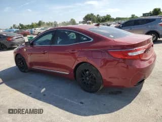 ✅ 2013 Hyundai Azera • VIN: KMHFG4JG1DA246270 • Лот: 67242375. Опубликован ранее на Copart с пробегом 107 629 миль. Бесплатный доступ к архиву аукционных продаж из США и подробный отчёт об истории автомобиля на DreamBid. Изображение 2.