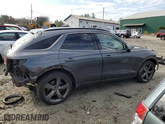 ✅ 2023 Genesis GV70 2.5T • VIN: KMUMADTB2PU096782 • Лот: 79234024. Опубликован ранее на Copart с пробегом 52 870 миль. Бесплатный доступ к архиву аукционных продаж из США и подробный отчёт об истории автомобиля на DreamBid. Изображение 3.