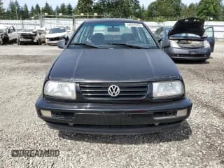 ✅ 1996 Volkswagen Jetta • VIN: 3VWWA81H0TM105498 • Lot: 58062665. Listed on Copart with 119,964 mi. Free auction sales archive from the USA and detailed vehicle history report at DreamBid. Image 5.