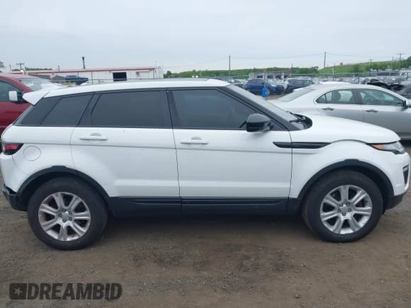 ✅ 2016 Land Rover Range Rover Evoque SE • VIN: SALVP2BG2GH085063 • Lot: 42337615. Listed on IAAI with 99,391 mi. Free auction sales archive from the USA and detailed vehicle history report at DreamBid. Image 13.
