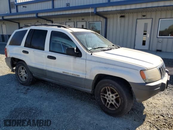 ✅ 2002 Jeep Grand Cherokee Laredo • VIN: 1J4GW48N62C119509 • Lot: 50392685. Listed on Copart with 194,894 mi. Free auction sales archive from the USA and detailed vehicle history report at DreamBid. Image 4.