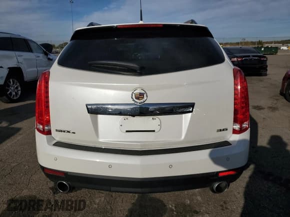 ✅ 2014 Cadillac SRX Premium Collection • VIN: 3GYFNGE32ES658467 • Лот: 82778375. Опубликован ранее на Copart с пробегом 108 159 миль. Бесплатный доступ к архиву аукционных продаж из США и подробный отчёт об истории автомобиля на DreamBid. Изображение 6.