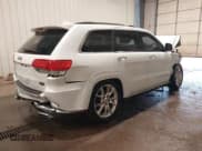 ✅ 2014 Jeep Grand Cherokee Summit • VIN: 1C4RJFJT7EC249398 • Lot: 43241993. Listed on IAAI with 115,708 mi. Free auction sales archive from the USA and detailed vehicle history report at DreamBid. Image 4.