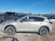 ✅ 2024 Mazda CX-5 Premium • VIN: JM3KFBDY1R0378092 • Lot: 41415595. Wystawiony na IAAI z przebiegiem 13 165 mil. Bezpłatny archiwum sprzedaży aukcyjnych z USA i szczegółowy raport historii pojazdu na DreamBid. Zdjęcie 14.