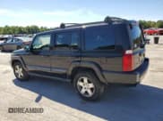 ✅ 2009 Jeep Commander Sport • VIN: 1J8HG48K69C527721 • Lot: 69904524. Wystawiony na Copart z przebiegiem 140 358 mil. Bezpłatny archiwum sprzedaży aukcyjnych z USA i szczegółowy raport historii pojazdu na DreamBid. Zdjęcie 2.