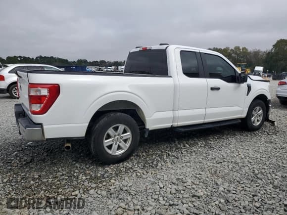 ✅ 2022 Ford F-150 XL • VIN: 1FTEX1C50NFA59570 • Lot: 91007335. Listed on Copart with 98,615 mi. Free auction sales archive from the USA and detailed vehicle history report at DreamBid. Image 3.