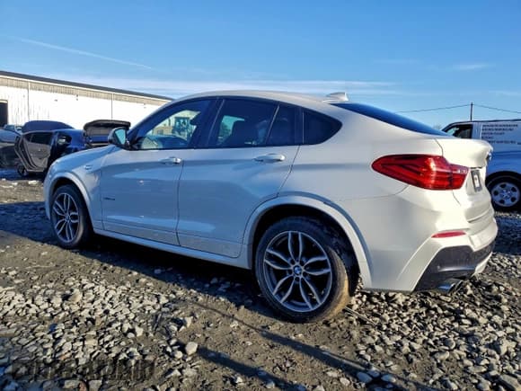 ✅ 2015 BMW X4 xDrive28i • VIN: 5UXXW3C52F0M87926 • Lot: 94218295. Listed on Copart with 94,567 mi. Free auction sales archive from the USA and detailed vehicle history report at DreamBid. Image 2.