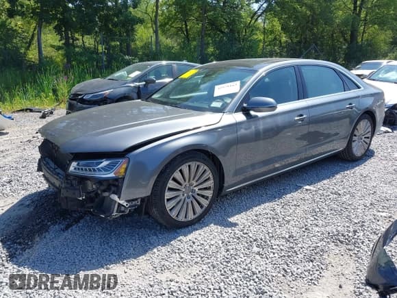 ✅ 2015 Audi A8 4.0T • VIN: WAU32AFD6FN024626 • Lot: 42978163. Wystawiony na IAAI z przebiegiem 143 595 mil. Bezpłatny archiwum sprzedaży aukcyjnych z USA i szczegółowy raport historii pojazdu na DreamBid. Zdjęcie 2.