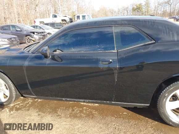 ✅ 2013 Dodge Challenger SXT • VIN: 2C3CDYAG5DH591010 • Lot: 41649468. Wystawiony na IAAI z przebiegiem 159 327 mil. Bezpłatny archiwum sprzedaży aukcyjnych z USA i szczegółowy raport historii pojazdu na DreamBid. Zdjęcie 14.