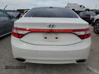 2013 Hyundai Azera с VIN KMHFH4JG7DA232922, выставлен на аукционе Copart как лот 88146315 с пробегом 156 128 миль миль и Чистый • Clean title. История ставок и продаж доступна на DreamBid. Изображение 6.
