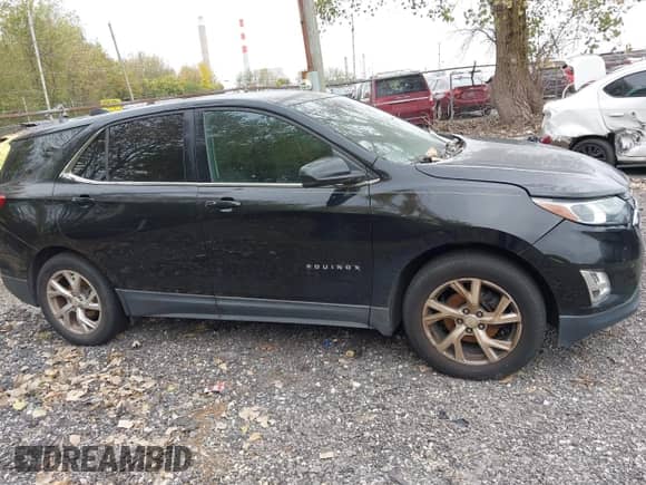 2018 Chevrolet Equinox LT z VIN 3GNAXJEV3JL260088, wystawiony jako IAAI lot #43517514 z przebiegiem 100 727 mil mil oraz . Historia ofert i sprzedaży dostępna na DreamBid. Obrazek 13.