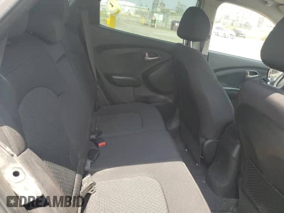 2013 Hyundai Tucson GL with VIN KM8JT3AC4DU758441, listed as a Copart auction lot 63911745 with 180,564 mi miles and Salvage title. Bid and sale history available at DreamBid. Image 11.