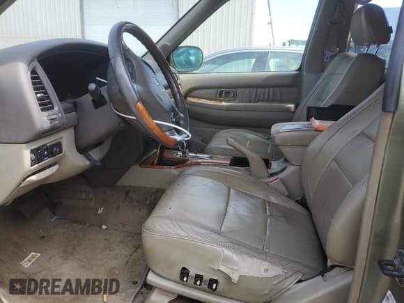✅ 2002 Infiniti QX4 Luxury • VIN: JNRDR09Y82W261585 • Lot: 70190915. Wystawiony na Copart z przebiegiem 205 888 mil. Bezpłatny archiwum sprzedaży aukcyjnych z USA i szczegółowy raport historii pojazdu na DreamBid. Zdjęcie 7.