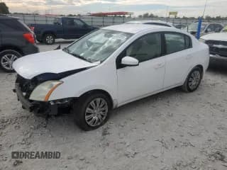 ✅ 2009 Nissan Sentra S FE+ • VIN: 3N1AB61EX9L617534 • Lot: 82604815. Listed on Copart with 159,431 mi. Free auction sales archive from the USA and detailed vehicle history report at DreamBid. Image 1.