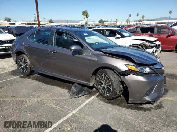 2020 Toyota Camry Hybrid SE с VIN 4T1G31AK8LU535159, выставлен на аукционе Copart как лот 85563505 с пробегом 90 438 миль миль и Списание • Salvage title. История ставок и продаж доступна на DreamBid. Изображение 4.
