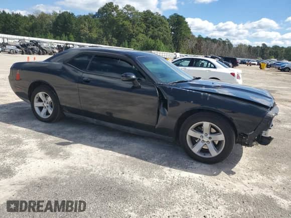 2013 Dodge Challenger SXT z VIN 2C3CDYAG5DH736384, wystawiony jako Copart lot #86122405 z przebiegiem Nie podano mil oraz Szkoda całkowita • Salvage title. Historia ofert i sprzedaży dostępna na DreamBid. Obrazek 4.