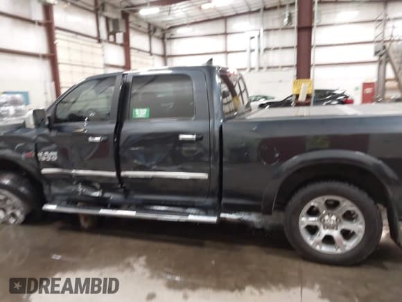 ✅ 2018 Ram 1500 Laramie • VIN: 1C6RR7VMXJS229901 • Lot: 42060986. Listed on IAAI with 65,969 mi. Free auction sales archive from the USA and detailed vehicle history report at DreamBid. Image 13.